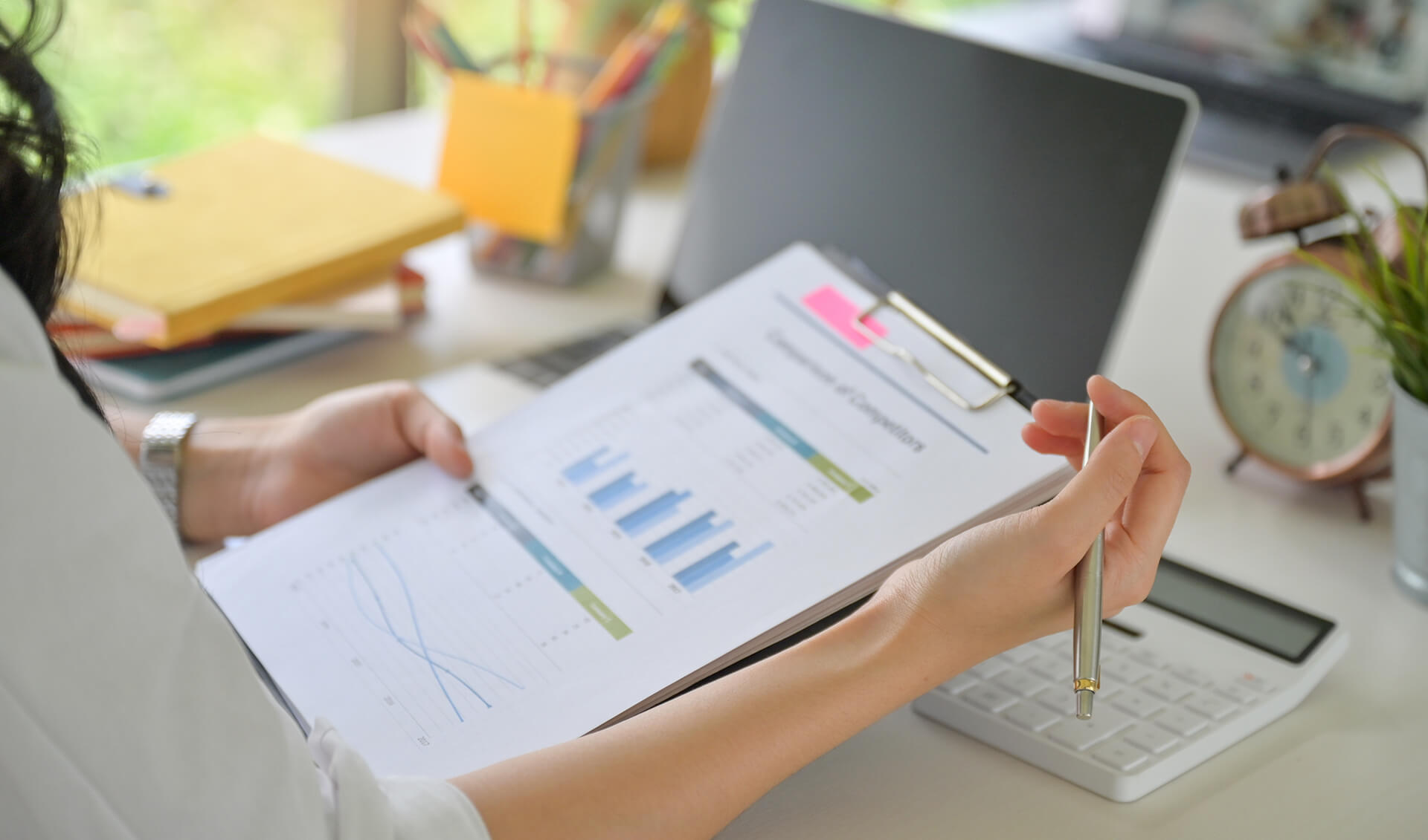Tax professional reviewing financial reports